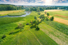 Aerial View Of Countryside And Brook On A Spring Sunny Day. Beautiful Nature Landscape In Spring