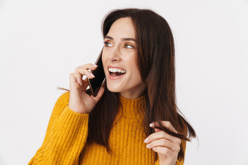 Sticker - Image of beautiful brunette adult woman smiling and talking on cellphone