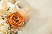 Love And Valentine's Day Concept. Close Up Of Brown Orange Roses Flower Bouquet On White With Copy Space.