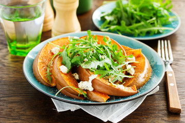 Canvas Print - Baked pumpkin with feta and herbs. Selective focus