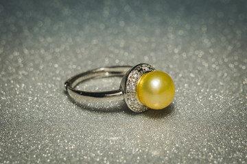 Silver ring with yellow pearl