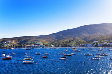 Wall Mural - Boats at Cadaques village on the bay in the Mediterranean Sea in summer, Catalonia, Girona province, Costa Brava coast.