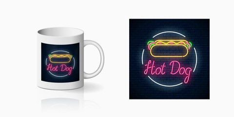 Wall Mural - Neonprint of hot dog cafe sign on ceramic mug mockup. Branding identity design sign of a fast food in neon style on cup