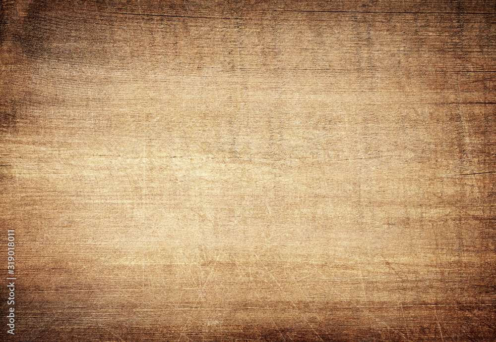 Brown scratched wooden cutting board. Wood texture - obrazy, fototapety, plakaty 