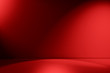 Leinwandbild Motiv Beams of spotlight on a red background