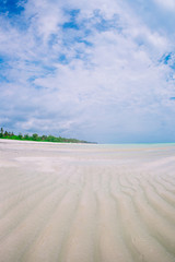 Wall Mural - Idyllic tropical beach in Caribbean with white sand, turquoise ocean water and blue sky