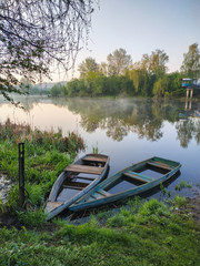 boats near at river in willow forest