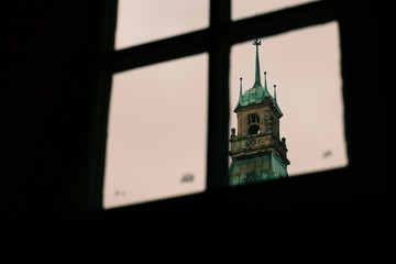 Ancient church bell tower with a clock