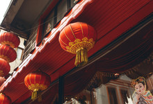 Traditional Asian Or Oriental Red Lanterns On A Building.