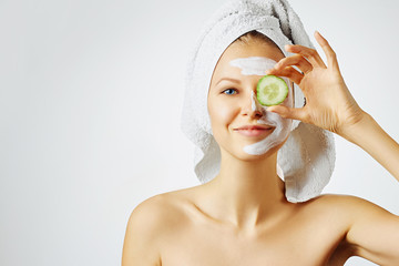 Wall Mural - cosmetology, skin care, face treatment, spa and natural beauty concept. woman with facial mask holds