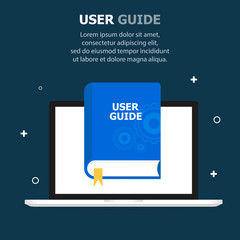 The blue book USER GUIDE is depicted on the computer screen. Dark blue background, white small objects. The text is written from above.