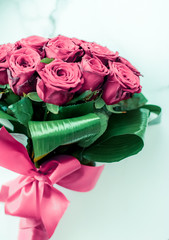 Wall Mural - Luxury bouquet of pink roses on marble background, beautiful flowers as holiday love present on Valentines Day