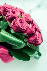 Poster - Luxury bouquet of pink roses on marble background, beautiful flowers as holiday love present on Valentines Day