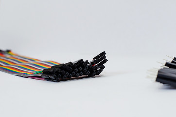 connection of colored wires on a white background