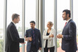 © eakgrungenerd - Group of businesspeople meeting talking together in office, brainstorming conference, Teamwork concept.