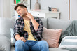 © Pixel-Shot - Scratching allergic man at home