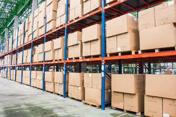 Rows of material boxes or product boxes in warehouse area.