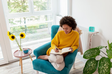 Wall Mural - Woman writing a diary