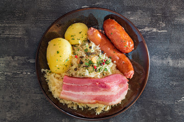 Wall Mural - Central and Eastern European cuisines choucroute - sauerkraut with riesling