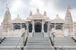 White Houston Hindu temple steps on a cloudy day