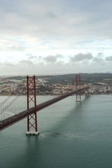 25 de abril bridge with lisbon in the background