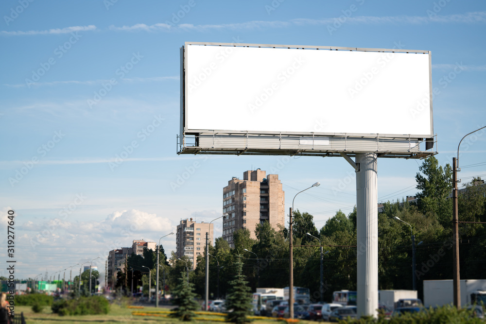 big billboard standing in the city. white advertising field for advertising. Mockup billboard - obrazy, fototapety, plakaty 
