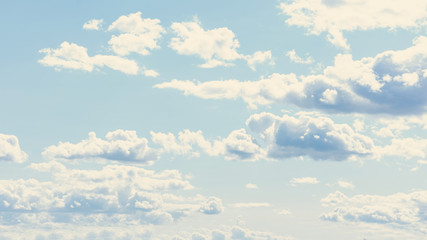 Wall Mural - blue sky with fluffy clouds, abstract background, 16:9