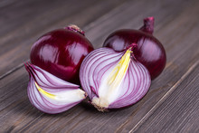 Red Onions On Rustic Wood