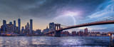 Fototapeta Nowy Jork - new york city skyline travel destination at dramatic sunset over manhatten