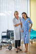 © sunti - The doctor supports the patient walking