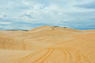  desert at white sand dunes mui ne with blue sky in vietnam