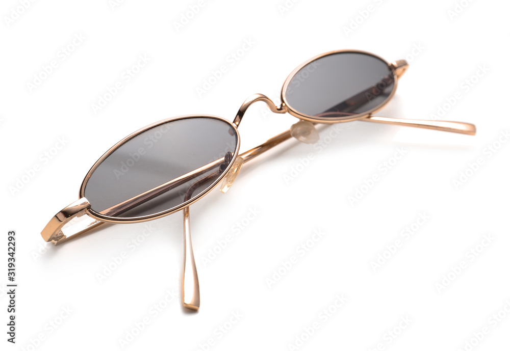Stylish sunglasses on white background