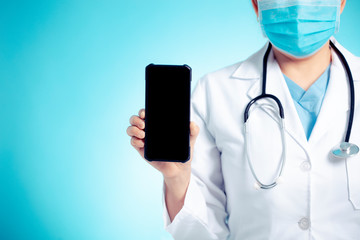 doctor with stethoscope and smart phone in hand for medical exam concepts