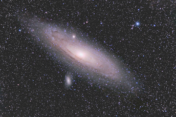 Wall Mural - a large galaxy in outer space. photo of a galaxy with a long exposure. deep space and space objects.