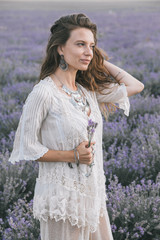 Wall Mural - Boho styled model in lavender field