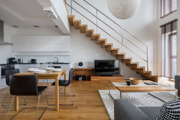 two-floor apartment with wooden elements
