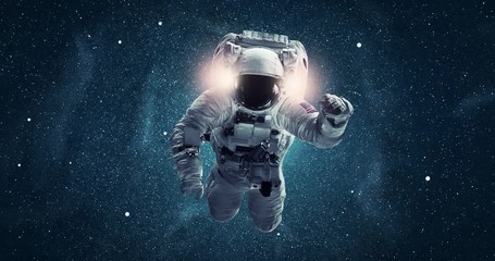 animation of astronaut flying in space with galaxy and stars. elements of this image furnished by na