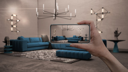 Wall Mural - hand holding smart phone, ar application, simulate furniture and interior design products in real ho