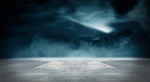 Futuristic Empty Night Scene. Empty Street Scene Background With Abstract Spotlights Light. Night View Of Street Light Reflected On Water. Rays Through The Fog. Smoke, Fog, Wet Asphalt With Reflection