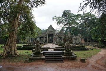 Wall Mural - Old Khmer ruins of a religious temple in the cambodian jungle 