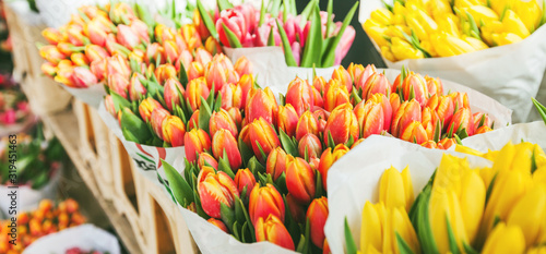 tulips for sale at street flowers market Wallpaper Mural