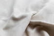 Natural linen fabric texture. Rough crumpled burlap background. Selective focus. Closeup view