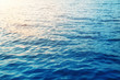 © Kirill Gorlov - Dark blue water surface with sunset light redlection. Sea or ocean water background
