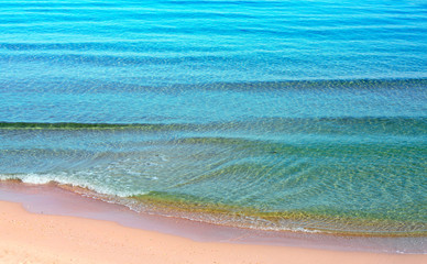 Sea wave and sand. Abstract nature background.