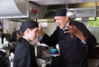 © JackF - Exasperated chef scolding female employee