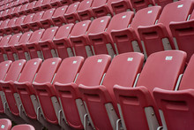 Rows Of Red Empty Seats In Stadium