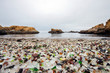 © Tandem Stock - A view of Glass Beach in Fort Bragg, California. Glass Beach is a beach in MacKerricher State Park that is abundant in smooth sea glass created from years of dumping garbage into an area of coastline near the northern part of the town.