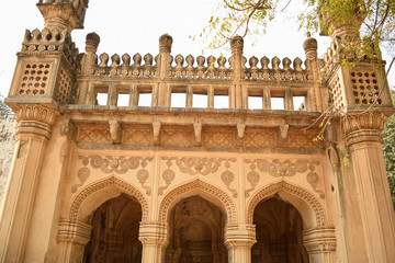 Wall Mural - Minaret at the Great Mosque at the tombs of the seven Qutub Shahi rulers in the Ibrahim Bagh India