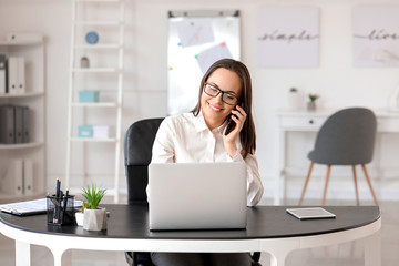 Young businesswoman working in modern office