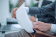 © ASDF - close up. businessman opening briefcase sitting at office Desk